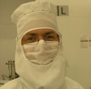 Picture of Prof. Dr. Heiland in cleanroom dress